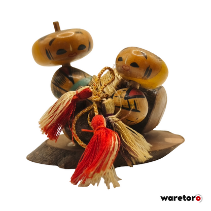 Kokeshi omiyage à tête de fruit