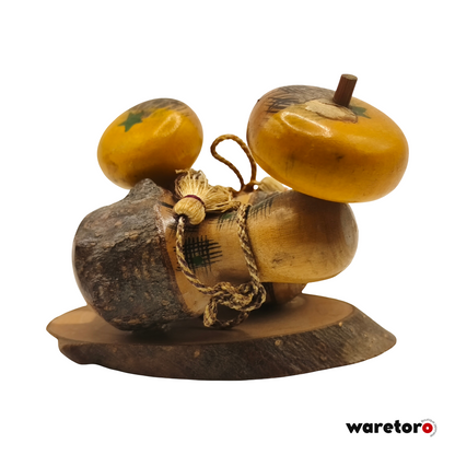 Kokeshi omiyage à tête de fruit