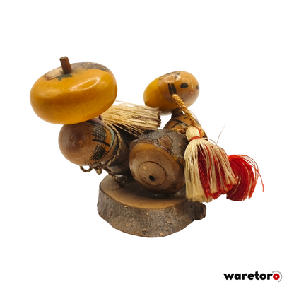 Kokeshi omiyage à tête de fruit